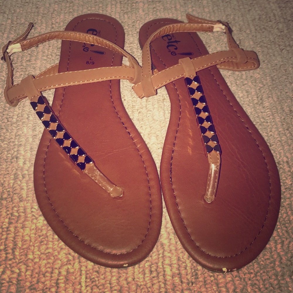 s•a•n•d•a•l•s